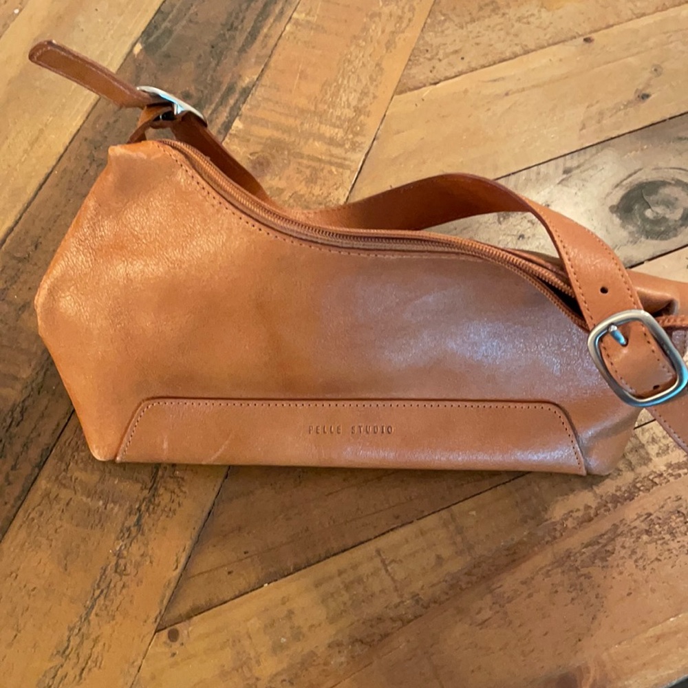 “Pelle Studio” Wilson’s leather